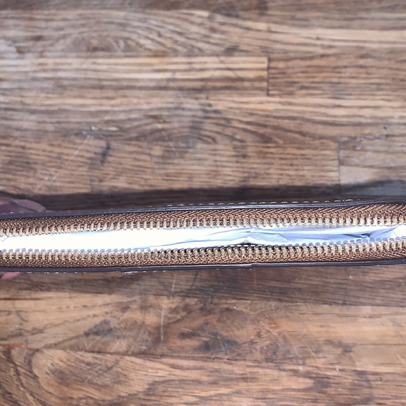 Coach brown and beige signature corner zip wristlet. - Picture 4 of 6